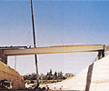 Appian Way Bridge Spanning the Great Western Highway at Woodford Bends, New South Wales. It comprises twin steel troughs with a composite reinforced concrete slab deck.