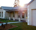 McDonald Jones Tenterfield Display Home with roof made from COLORBOND® steel in the colour Jasper® and Framing made from ZINCALUME® steel