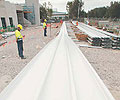 Onsite milling of 7,000 square metres of LYSAGHT KLIP-LOK 700 HI-STRENGTH&reg; concealed fix cladding to roof a new Virgin Blue maintenance hangar at Brisbane airport.