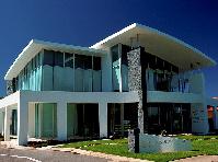Scott Salisbury Homes headquarters is a showcase for contemporary design and quality materials. The roof is made from LYSAGHT CUSTOM ORB&reg; in Surfmist&reg; COLORBOND&reg; steel.